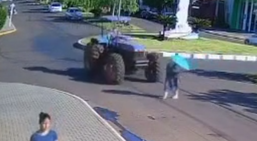 Woman Jaywalking Gets Run Over By Tractor