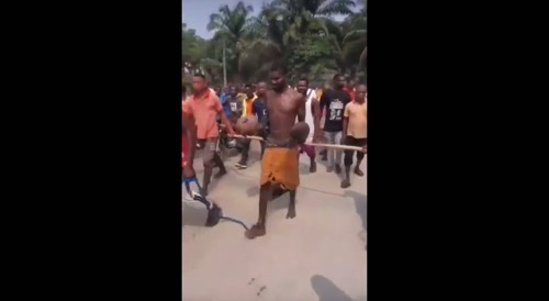 Chilling With His Friend's Severed Heads In Delta State