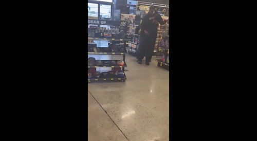 Two men confront each other in a store...