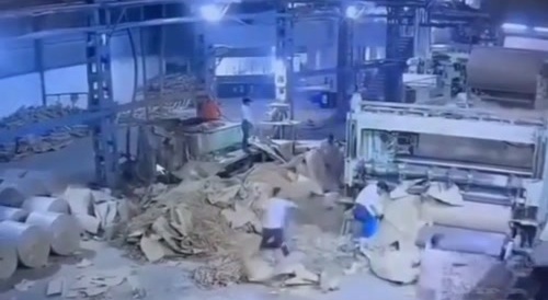 Worker sucked instantly into roller machine...