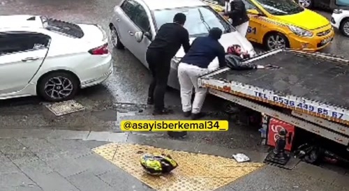 angry female driver ran over delivery man with her car..