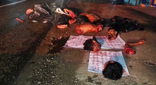 CNTG cartel displays dismembered people in the street. *Mexican puzzle*