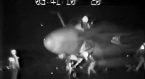 American navy officer gets sucked into jet engine, survives with minor injuries.