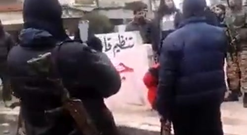 Video shows the moment a woman accused of adultery was executed by a member of the Al-Nusra group, the Syrian branch of Al-Qaeda