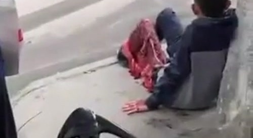 Unemployed faggot gook begging on the street