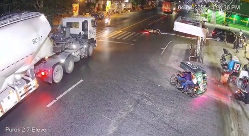 Rider loses control and gets run over by speeding truck