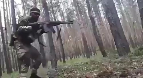 dumbass akhmat soldier dual wielding AKs
