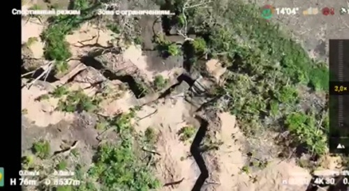 russian drone dropping on a ukrainian trench bunker