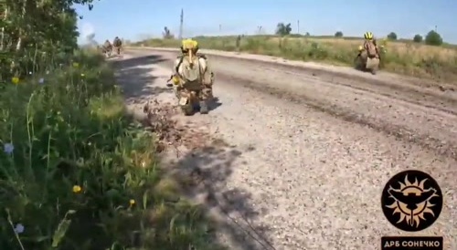 ukrainians taking position on a paved road