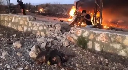footage showing a dead man in a press vest