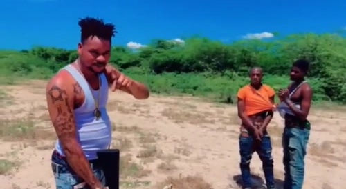 Haitian gang leader captures 2 guys and kills them