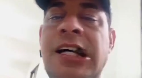 Man examining dead body and eats a piece of it