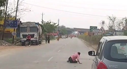 Driver falls out car