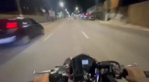Motorcyclist collides with a pickup truck.