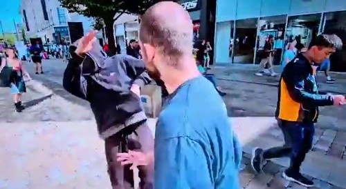 Masked tough guy threatens to pull out knife