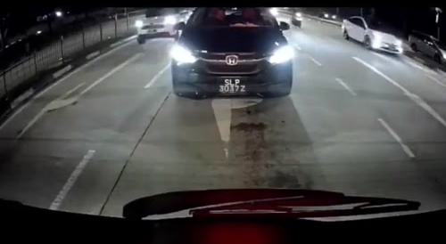 Motorcyclist Sandwiched