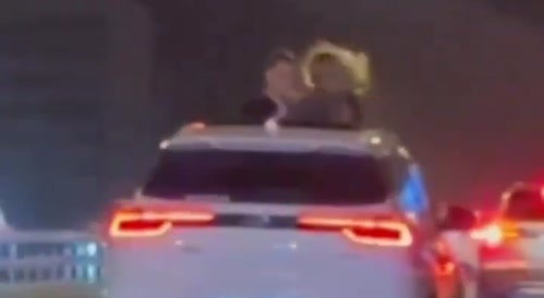 People standing through moonroof/sunroof crash