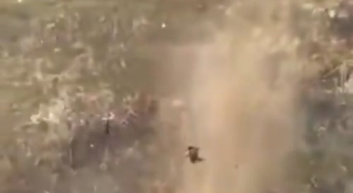 Russian flies high up in the air after an explosive detonation