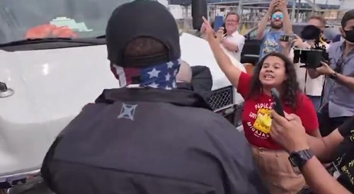 Fatso Woman Tries to Stop ICE Van