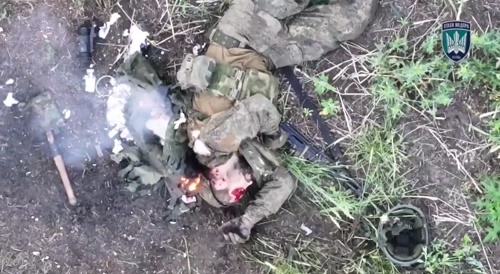 Russian being attacked after already being attacked