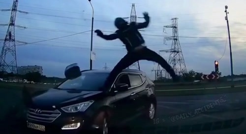 motorcyclist meet car