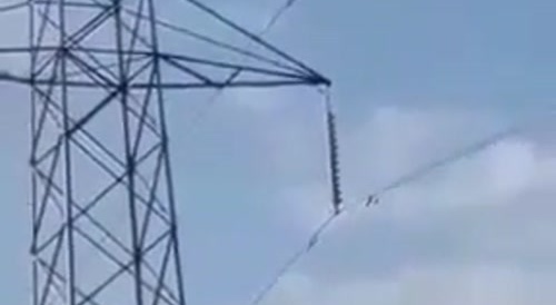 Man in Kenya plays with power lines over death of his mother.