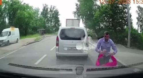 Man goes flying after being hit by a car.