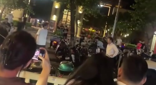 Asian men having a spit war