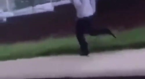 Someone runs then dives under van