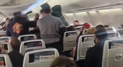 Liberal Lunatic Puches Old Man in Plane