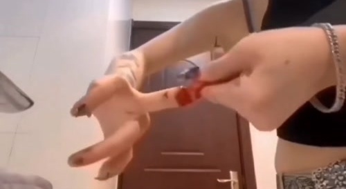 Her Middle Finger Is Too Long
