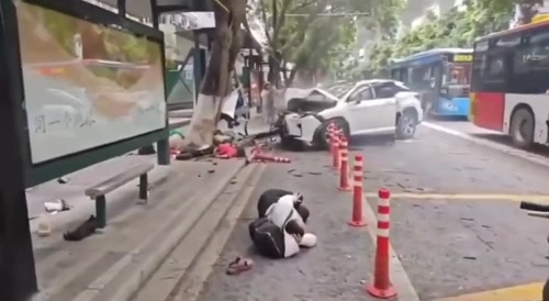 Asian Driver Clears Bus Stop