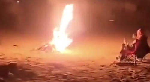 Fireworks Tossed Into Bonfire