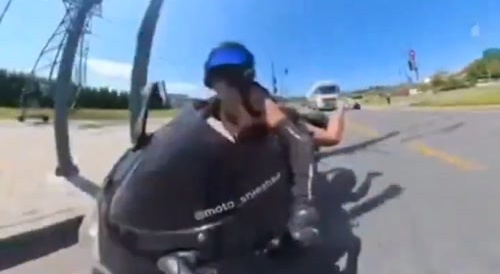 She falls off motorcycle under braking