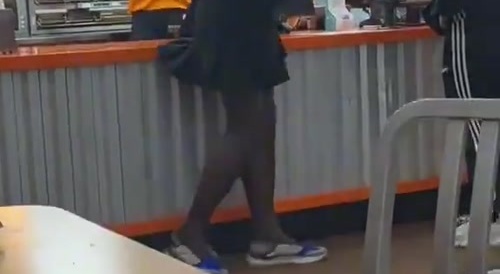 Tranny Makes Her Own Chicken at Popeyes