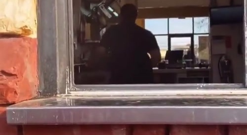 Snarky Ratchet Climbs Drive-Thru Window