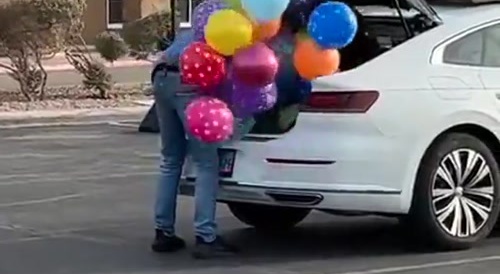 LMAO - Guy wants to put bunch of balloons in car trunk... !