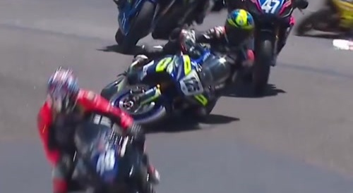 MotoGP rider crashes then gets ran over
