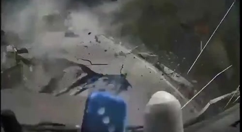 Falling giant rocks smash trucks on road... !