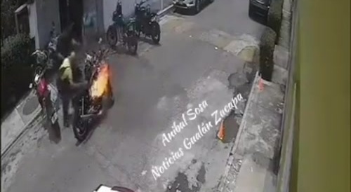 Motorcycle ignites in flames