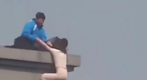 Man stopped suicide attempt by grabbing woman's hair...