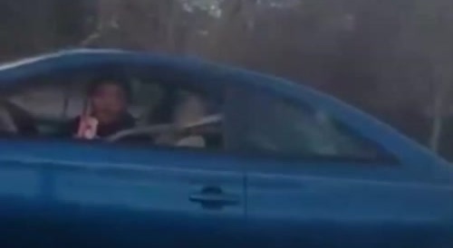 Naked Woman Climbs on, Pees, and Shits on Car!