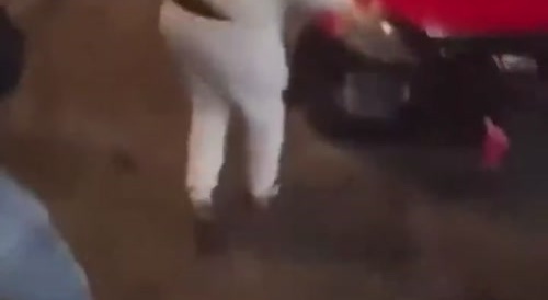 Someone ran over by a drifting car.