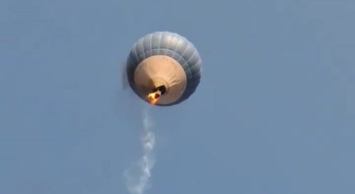 Man jumps from balloon which keeps burning... !
