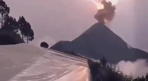 People in awe for lightnings fireworks striking top of volcano... !