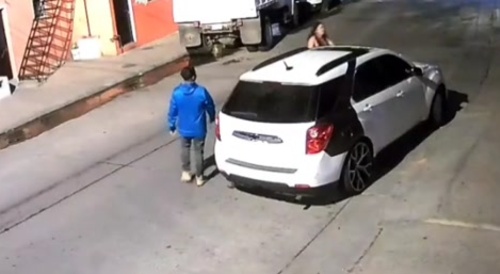 Woman hitting her bf's vehicle with broom & he shot her