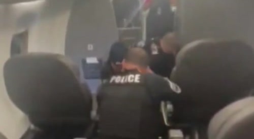 Possesed Man Gets a Civilian Exorcism - in da Plane