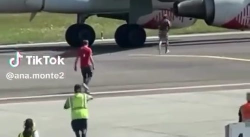 Guy jumps into Plane Turbine in Italy