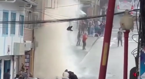 Careless people injured by collapsing roof of burning building... !