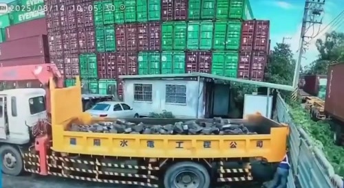 Truck reverses into someone